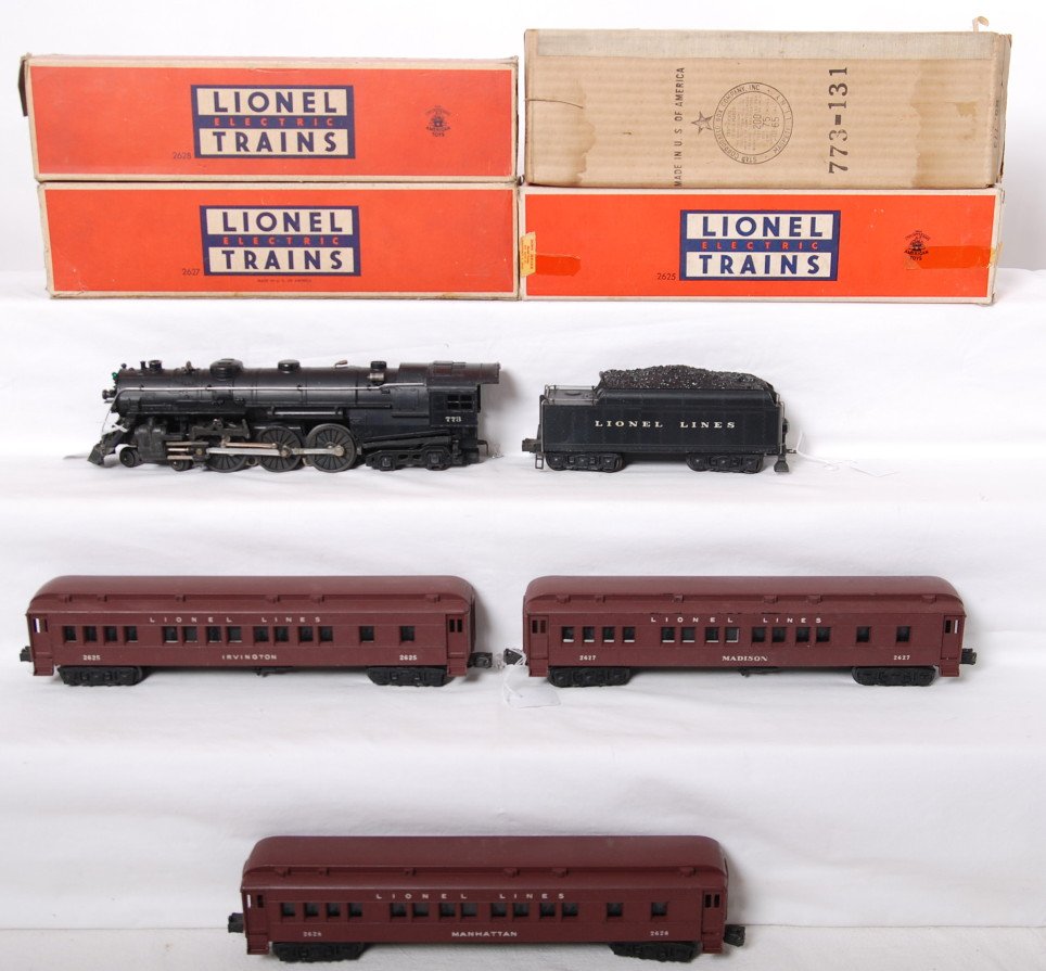 Lionel 773, 2426W, 2625, 2627, 2628 Madison passe: Postwar Lionel O gauge 773 Hudson steam locomotive with 2426W Lionel Lines whistle tender, 2625 Irvington Pullman, 2627 Madison Pullman, and 2628 Manhattan Pullman. Cars have passenger silhouette wind