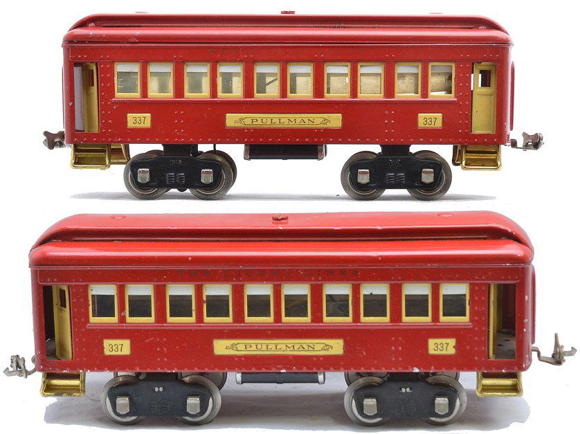Lionel two 337 Red Pullmans w/Cream Inserts: Lionel prewar standard gauge two 337 red Pullmans with cream inserts, brass steps and nickel journals. One of the Pullmans has paint touch ups on the roof. The cars are C7.