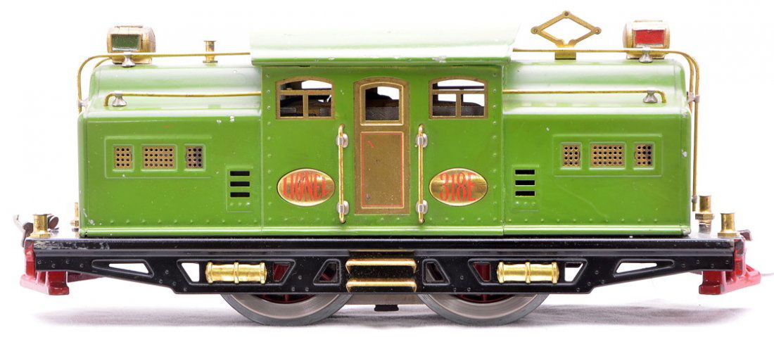 Lionel 318E Pea Green 0-4-0 Electric Loco: Lionel prewar standard gauge 318E pea green 0-4-0 electric loco. The loco has been rewheeled and one coupler is broken. Loco is C7-8.