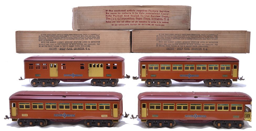 Lionel Terra Cotta Pass Cars 1767 1766 1768 1766: Lionel prewar standard gauge terra cotta passenger cars with maroon roofs, cream inserts, brass trim and copper journals including; 1767 baggage, 1766 Pullman and a 1768 observation in OBs. Also inclu