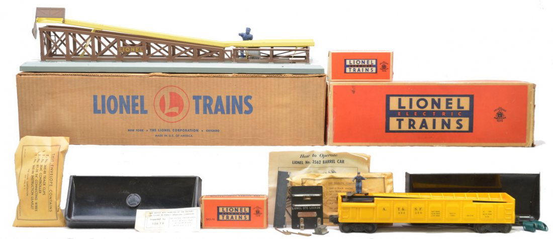 Lionel 362 Barrel Loader 3562-50 AT&SF Car MIB: Lionel postwar 362 barrel loader with sealed packet, 160 bin, box of 362-78 six barrels and a 3562-50 yellow operating AT&SF barrel car, packet complete with most items, box of 362-78 six barrels and