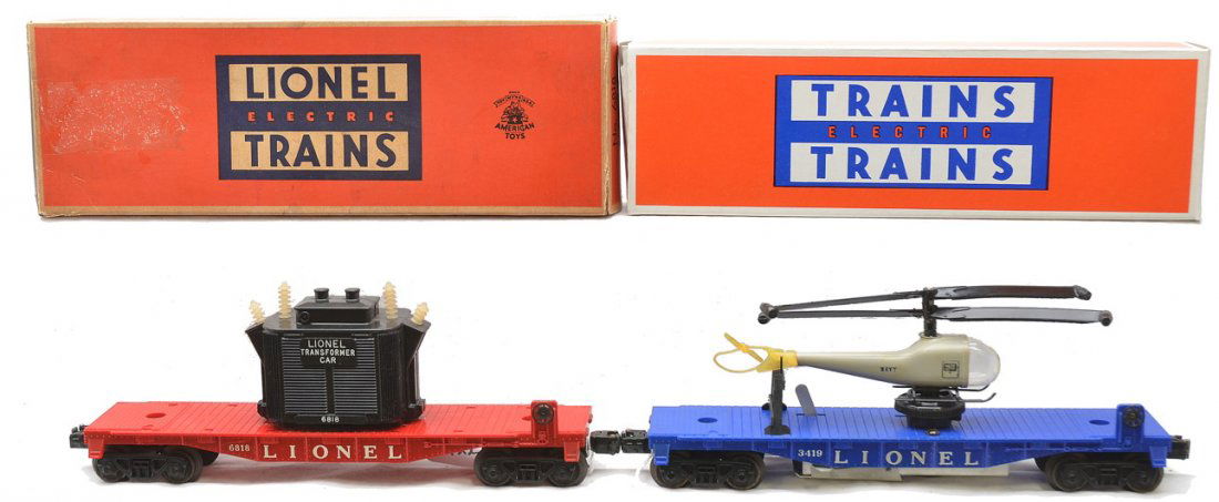 Lionel 3419 Helicopter Flatcar 6818 Transformer: Lionel postwar 3419 flatcar with helicopter lettered Navy in a reproduction box and a 6818 transformer car in OB that has replaced flaps. Cars are C8.