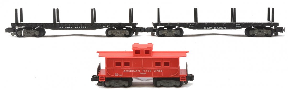 Am Flyer Freight Cars 24539 24577 24603: American Flyer S gauge freight cars; 24539 New Haven flatcar missing pipes, 24577 Illinois Central flatcar and 24603 red AFL caboose, C7.