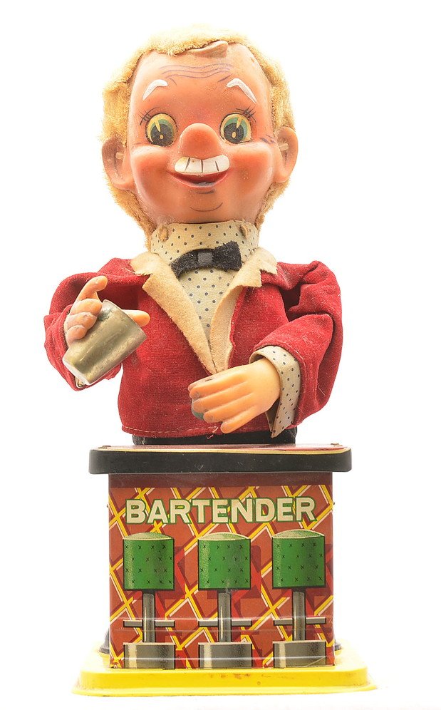 Rosko 1950s Tin Battery Operated Bartender: Rosko 1950s tin battery operated bartender with maroon vest and pink face and lithographed bar, C7.