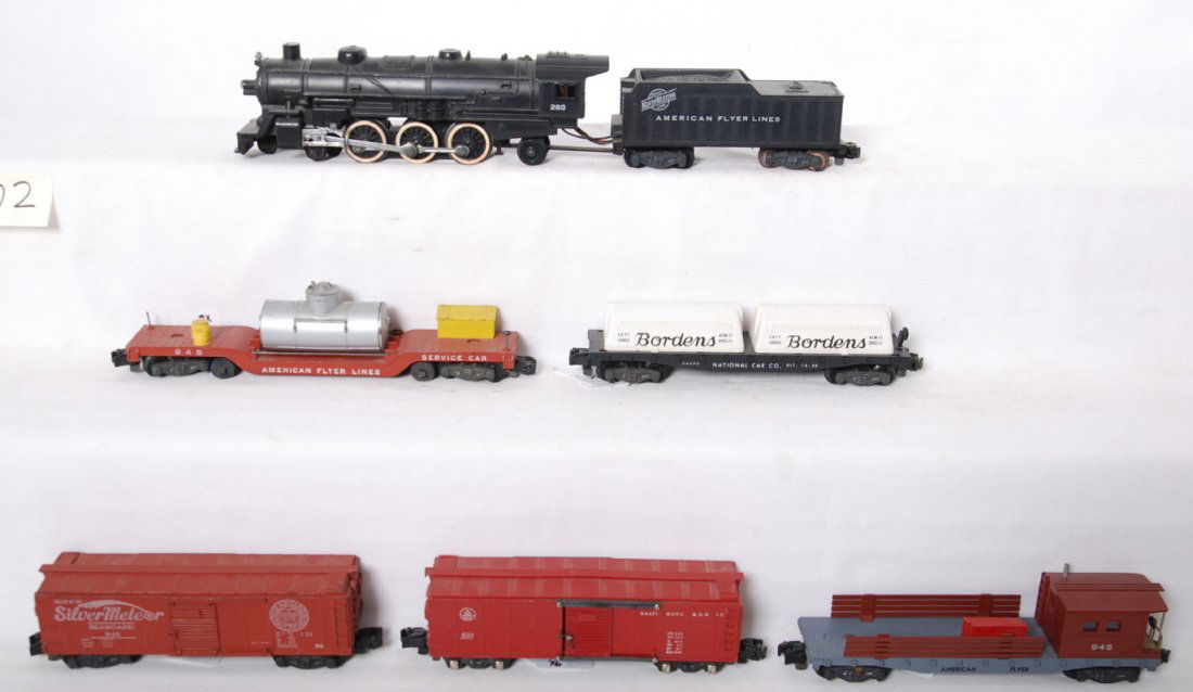 American Flyer 283, 948945, 942, etc: American Flyer postwar S gauge trains including 283 Chicago and Northwestern steam locomotive 948 track cleaning car, 633 Baltimore and Ohio caboose, 942 Seaboard boxcar, 945 work caboose, and 24575 B