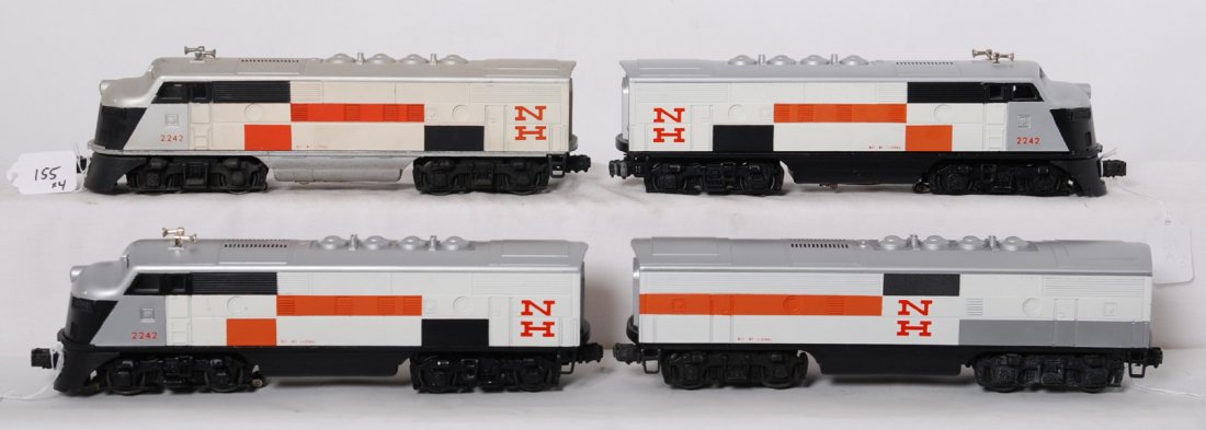 Lionel 2242 New Haven EMD F3a and F3b units: Reproduction Lionel 2242 New Haven F3 A and B unit shells on postwar chassis, three are restored. One A unit should clean to look C7 area, other two A units and one B unit look C7-8.