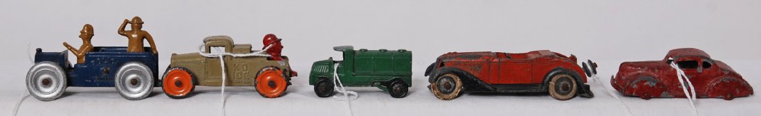 Tootsietoy, two Funnies cars and three others: Early Tootsietoy diecast toy vehicles. Two Funnies Series cars; KO Ice Company and Police Patrol. 231 red Chevrolet coupe. Graham-Paige convertible with ruble seat. 1920Õs Mack Tanker truck. KO Ice C