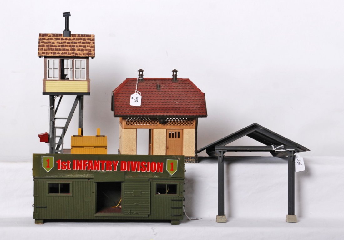4 G scale buildings, tower, restroom, etc: Modern G scale buildings. Includes switch tower with smoke, canopy shed, infantry boxcar with smoke, and restroom building. Buildings are C7. Due to the fragile nature and size of these buildings, we 