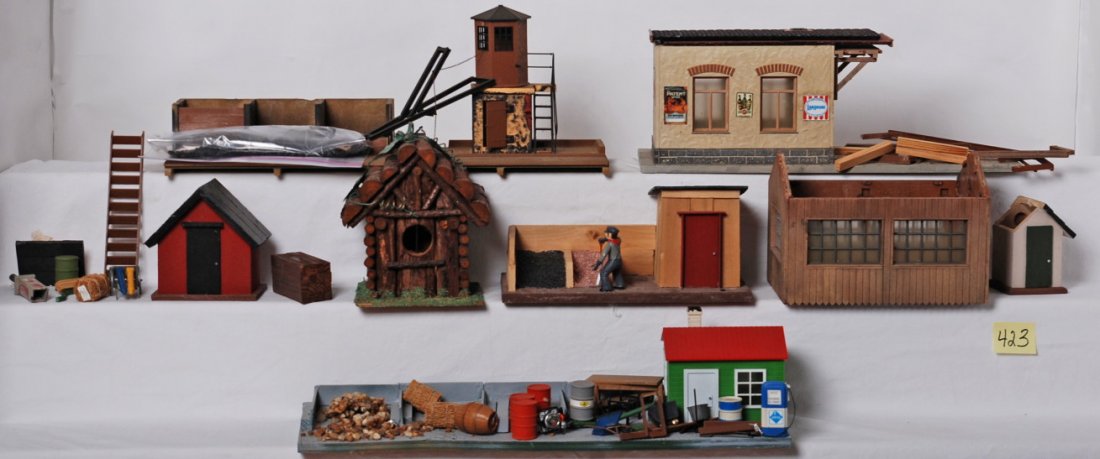 G scale materials dock, coal dock, and more: Group of G scale buildings including materials dock, coal dock, and other small sheds. See photos for best description. Due to the fragile nature and size of these buildings, we can not guarantee that