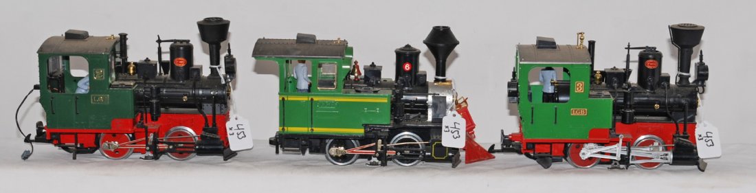 3 LGB steam locomotives 20211, etc: LGB modern G scale steam locomotives. Three locos include No. 6 with broken headlight, cracked pilot and whistle, No. 2 with some light body wear, and 20211 No. 2 in C8 condition. Other two locos are 