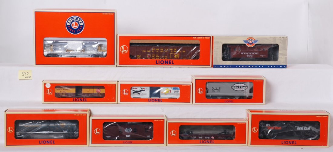 10 Lionel freight cars 17009, 26100, 52126, etc: Lionel modern O gauge freight cars in OB. Ten freight cars include 26841 Pennsylvania log dump car, 52126 Classic Toy Trains Milwaukee Road boxcar, 19286 Sylvester boxcar, 17009 New York Central hoppe