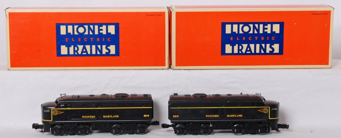 Lionel Western Maryland 18915, 18916 Alcos: Lionel modern O gauge Western Maryland Alco A units 18915 and 18916 in OBs. Locos are C7 with a few nicks and scratches and one missing number board. OBs have shelf wear and a few small rips.