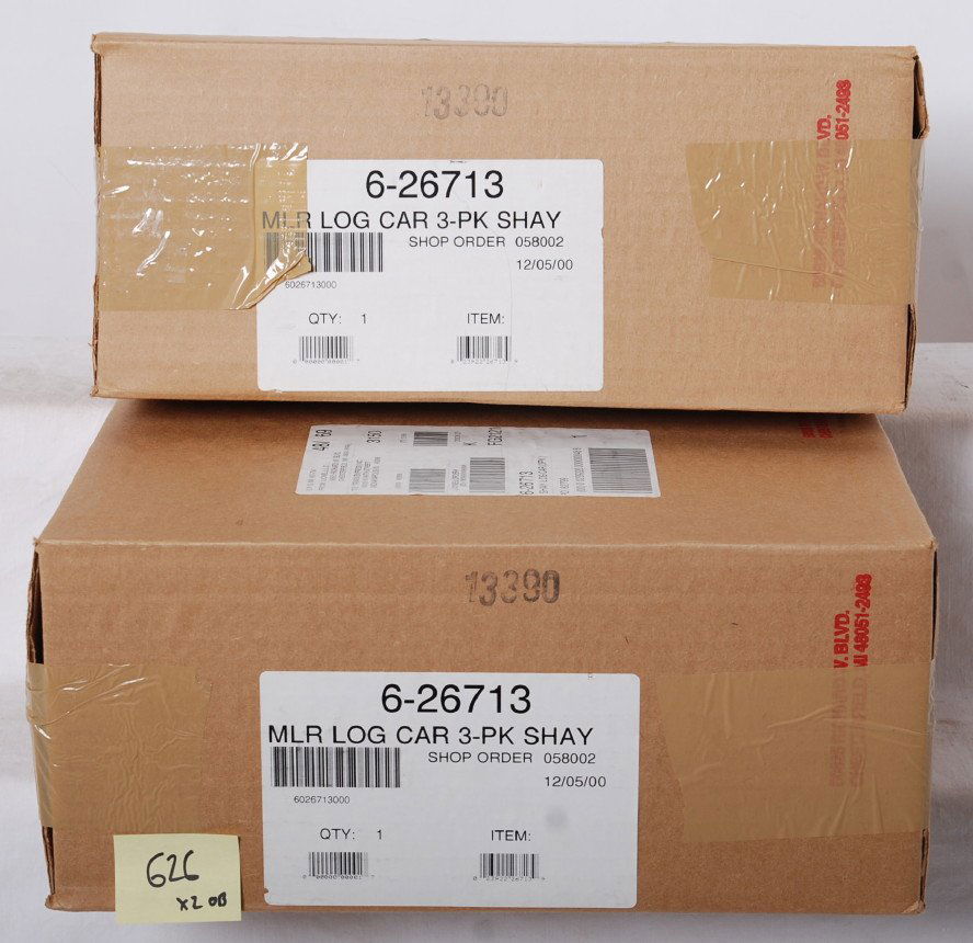 6 Lionel Shat lumber cars 26713: Lionel modern O gauge 26713 Shay log car three packs in OBs. Two packs of three cars are factory sealed in the master cartons C10.