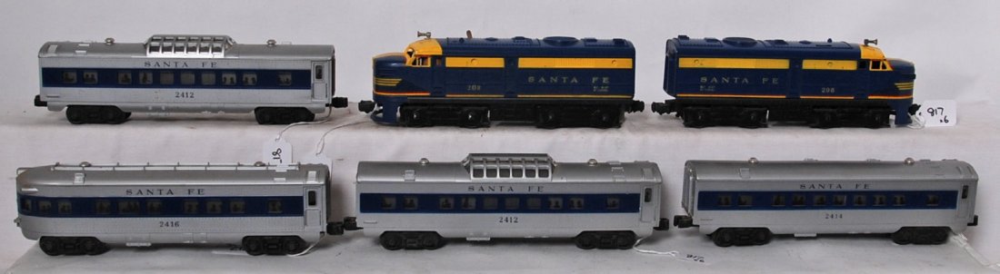 Lionel 208, 2412, 2412, 2414, 2416 Santa Fe diesel pass: Postwar Lionel O gauge Santa Fe diesel passenger train with 208P and 208T Alco A units, two 2412 vista domes, 2414 Pullman coach, and 2416 observation. Trains look C6 area.