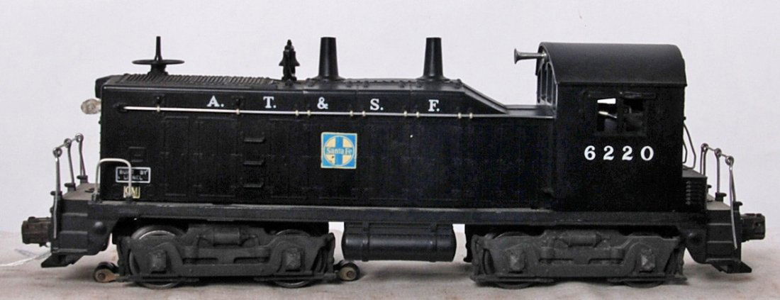 Lionel 6220 A.T.S.F. NW2 diesel switcher: Postwar Lionel O gauge 6220 A.T.S.F. NW2 diesel switcher loco, C7++. Loco has small GM decals.