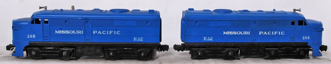 Lionel 205 Missouri Pacific Alcos with nose supports: Postwar Lionel O gauge 205P and 205T Missouri Pacific twin diesel Alco A units with nose supports. Chassis have some very light surface rust starting to form, shells should clean and polish C6-7.