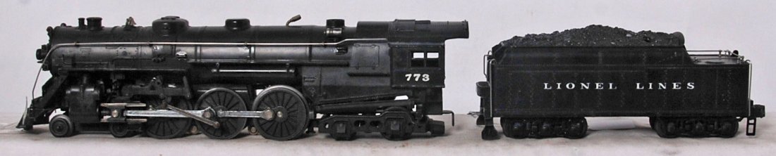 Lionel 1964 773 Hudson and 1950 2426W whistle tender: Postwar Lionel O gauge 1964-66 773 Hudson 4-6-4 steam locomotive with a 1950 2426W Lionel Lines whistle tender. Trains have touchups, trains look C7++ and with a little polishing will look slightly be