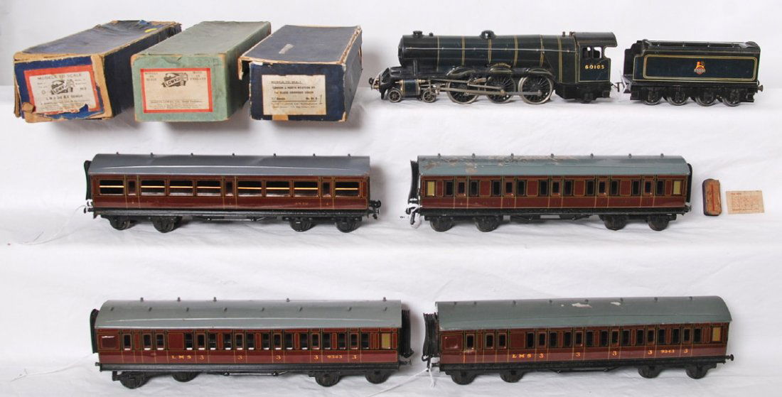 Basset Lowke Flying Scottsman passenger steam train: Basset Lowke O gauge 60103 Flying Scottsman steam locomotive and British Railways tender with four passenger cars, three in original boxes. Two LMS 3490 1st class, and two LMS 9343 3rd class coaches.