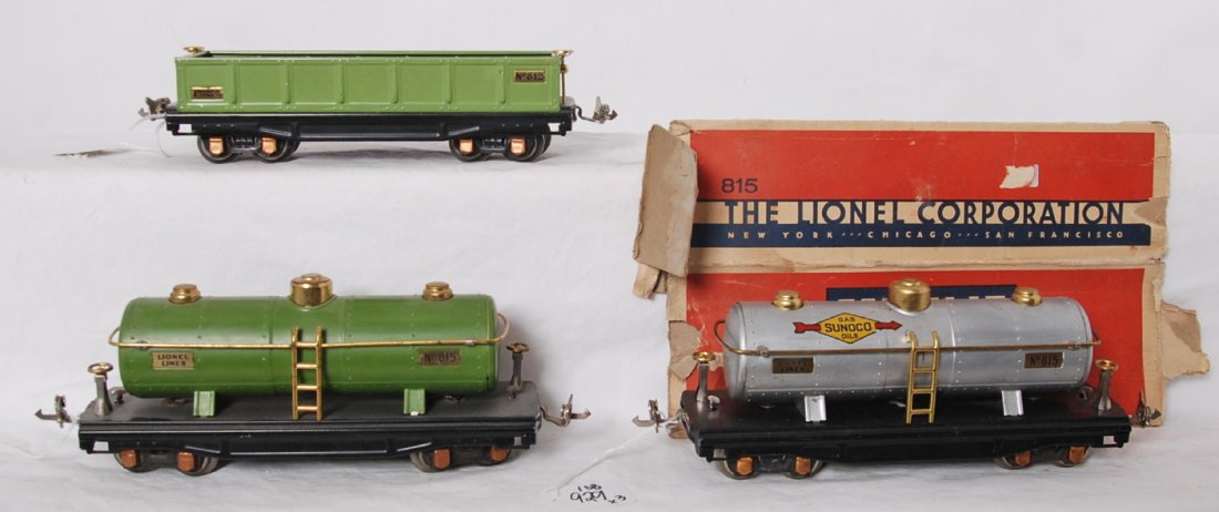 Lionel 812, 815, and 815 freight cars brass plates: Prewar Lionel O gauge 812 gondola in green, 815 tank in green, and 815 Sunoco in aluminum paint, better C7+ area. Trains have brass plates and copper journals. 815 box, flattened and missing flaps inc