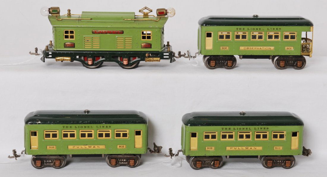 Rare Lionel MacyÕs 253E elec. w/two 603 Pullman, 604 ob: Prewar Lionel O gauge, rare MacyÕs set composed of: 253E 2-tone green boxcab electric loco with 2-tone green passenger cars, two 603 Pullman coaches, and a 604 observation. Trains have copper journal