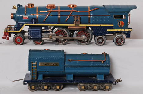 Rare Lionel 400E Blue Comet loco and tender w/cream str: Prewar Lionel standard gauge 400E Blue Comet steam locomotive and tender in 2-tone blue with cream stripe. Loco has a trailing wheel with casting fatigue, otherwise train is nicer C6. This is an incre