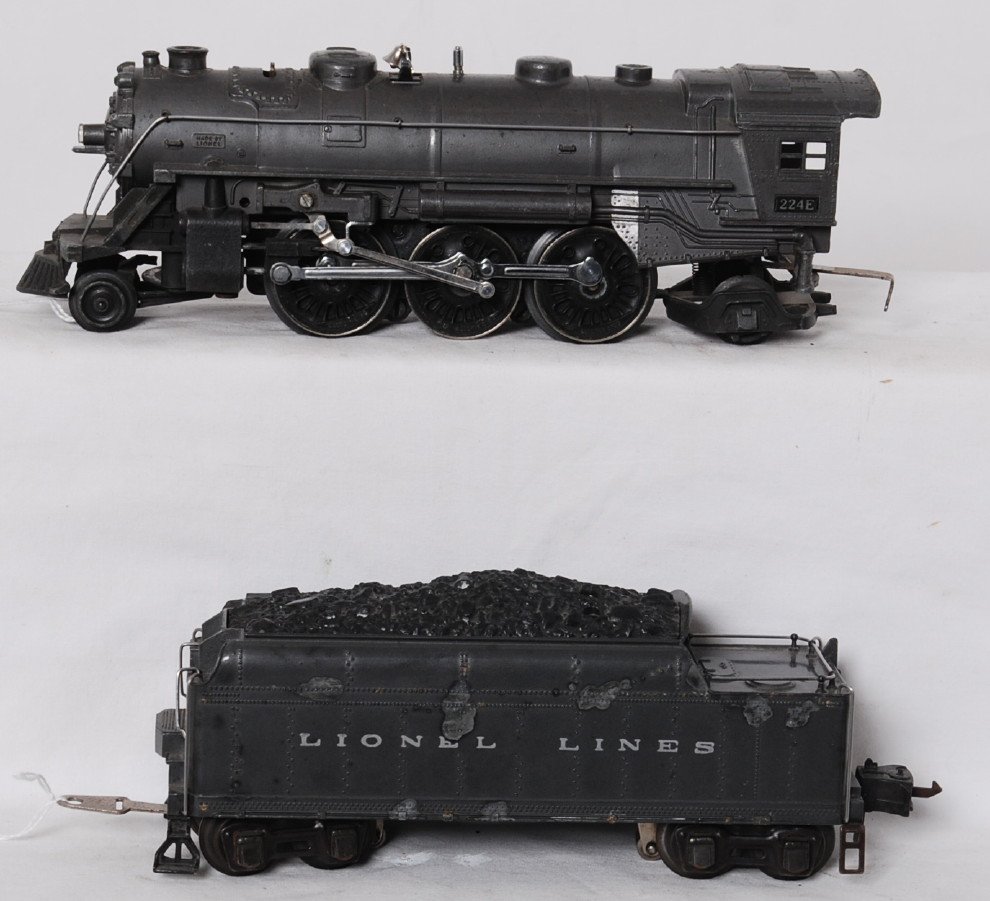 Lionel 2224W coal tender in GM w/matching 224E: Prewar Lionel O gauge 224E steam locomotive and super tough to find 2224W coal tender with whistle in Gun Metal gray paint with black journals and magnetic coupler. Loco has dinged cab corners, one wi