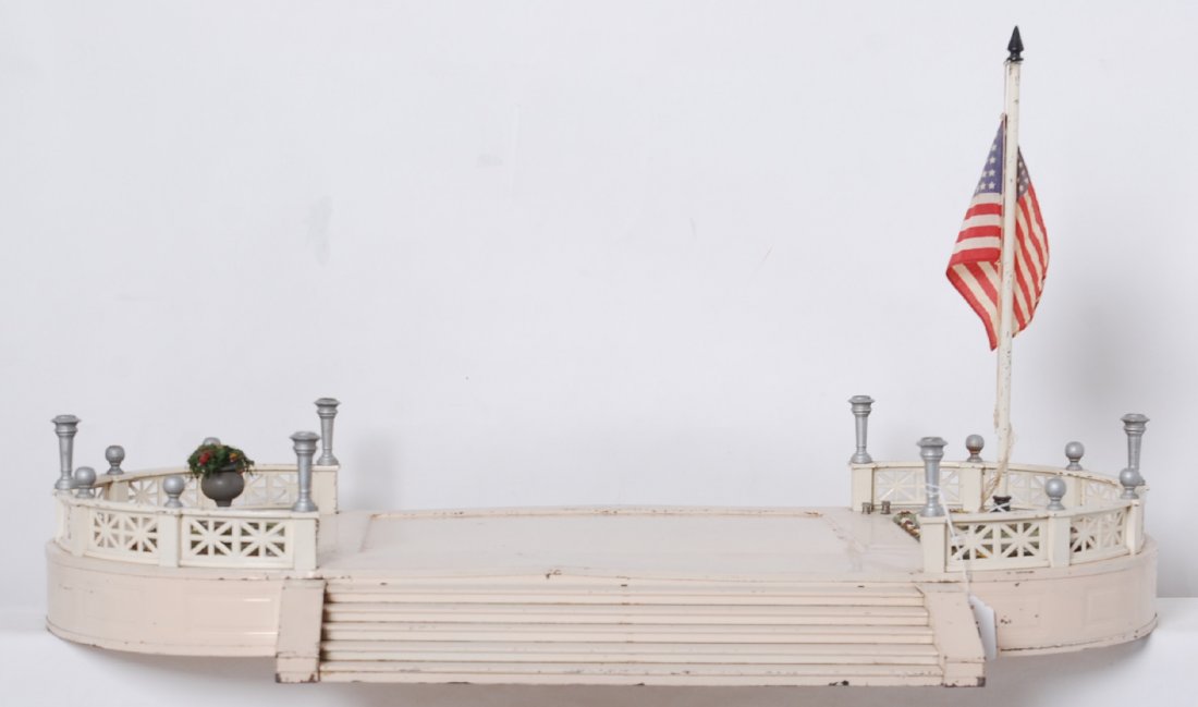 Lionel terrace with plots, 129? in late colors: Prewar Lionel standard gauge 129? terrace with plots in late colors, C6 with a little very light surface rust. Base measures 31-1/2 inches wide by 17-1/2 inches deep.