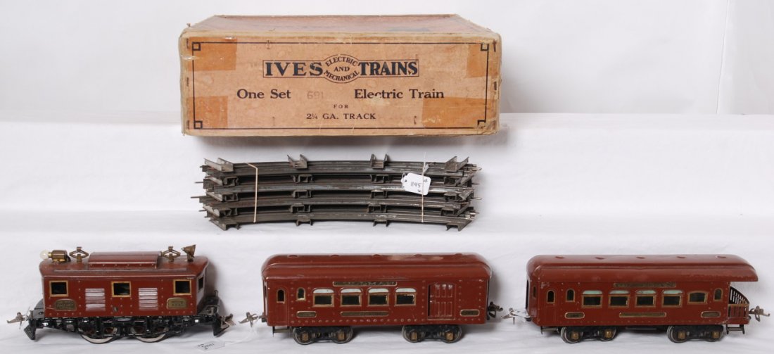Ives No. 691 boxed electric pass. set, 3235, 184, 186: Prewar Ives standard gauge No. 691 electric train set in original box consisting of: 3235 boxcab electric locomotive, 184 Buffet, and 186 observation. 186 has touchups to roof, otherwise trains look C