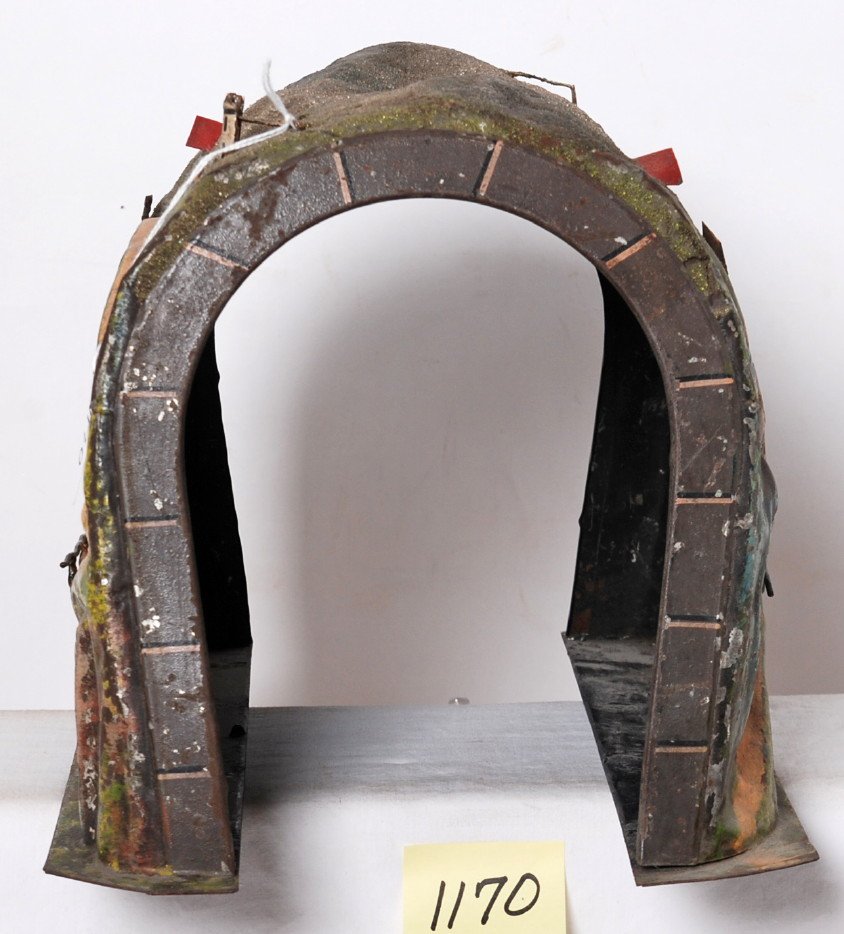Marklin O gauge hand painted prewar tunnel: Prewar Marklin O gauge hand painted tunnel with buildings and other trim. Could be some missing minor tree pieces. Interesting glass beading on hill top. Great looking very early piece, CA 1918.