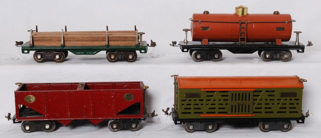 Lionel 511, 513, 515, 516 S.G. freight cars: Prewar Lionel standard gauge 511 flatcar w/lumber load rubber stamp lettering nickel trim, 513 stock car brass plates nickel journals, 515 tank brass plates nickel journals, 516 hopper brass plates ni