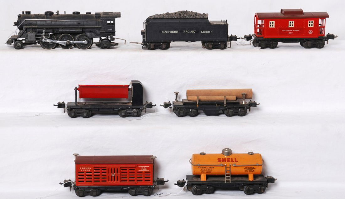 Lionel 224, 2224W, 3651, 3659, 2654, 2656, 2657: Prewar Lionel O gauge 224 steam locomotive, 2224W whistle tender, 3651 automatic lumber car, 3659 automatic dump car, 2654 Shell tank, 2656 Lionel Lines stockcar, 2657 caboose. Trains look C6-7, excep