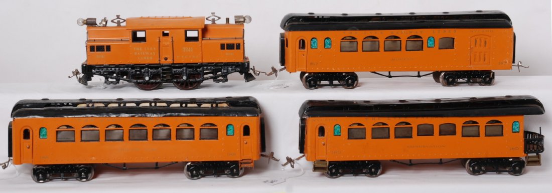 Ives wide gauge 3241 loco, 187, 188, 189 passengers: Prewar Ives wide/standard gauge 3241 center cab electric locomotive with 187 Buffet, 188 Parlor car, 189 observation, passenger cars. Loco has a bent cab roof edge, 188 has a broken and missing couple