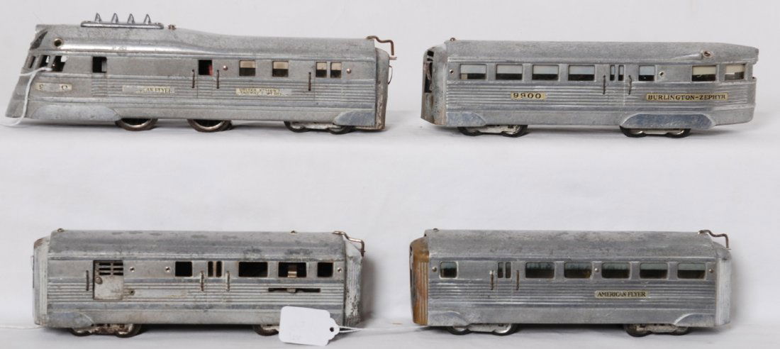 American Flyer O gauge Burlington Zephyr four unit pass: Prewar American Flyer O gauge Burlington Zephyr streamline articulated diesel passenger train with 9900 powered unit, unnumbered coach, 1166 baggage with reversing unit?, and 9900 observation. Units h
