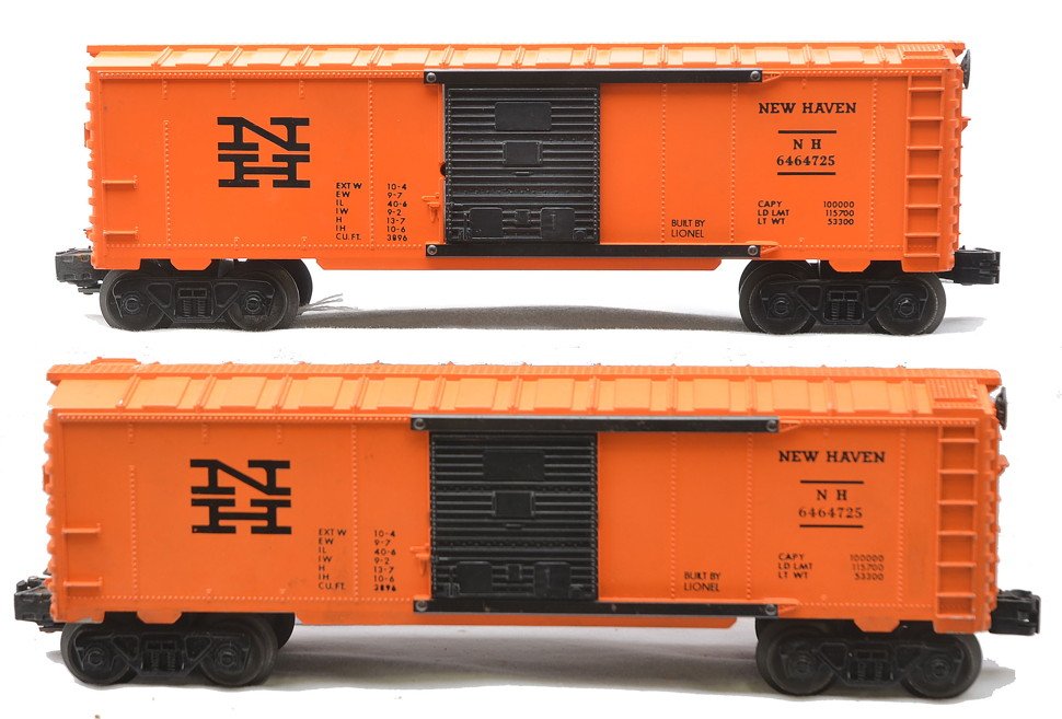 Lionel two 6464-725 New Haven Type III Boxcars: Lionel postwar two 6464-725 New Haven type IV boxcars. One end of the catwalk on one of the New Haven has been repaired. Each car has one truck that has been modified and incorrect tab couplers have b
