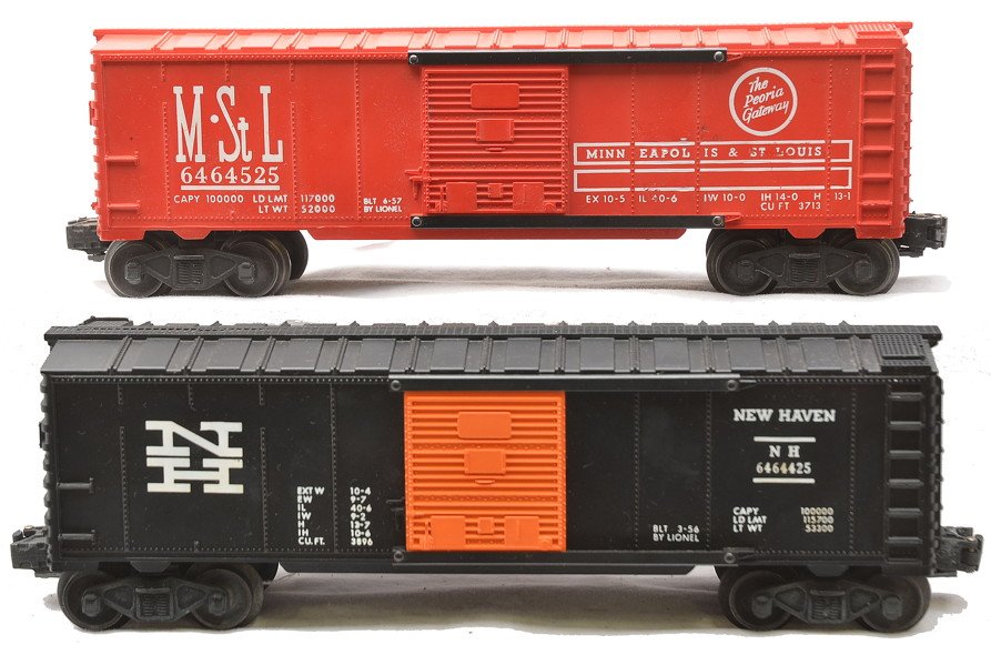 Lionel 6464-425 6464-525 Type IIb Boxcars: Lionel postwar 6464-425 New Haven type IIb boxcar and a 6464-525 Minneapolis & St. Louis type IIb boxcar, C8.