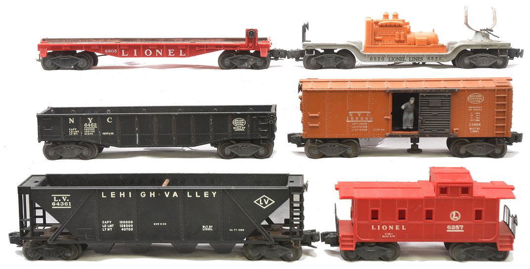 Lionel Freights 6805 6520 6462 6436 3464 6257: Lionel postwar freight cars; 6805 Atomic Energy Disposal flatcar missing one rail and the load, 6520 searchlight car missing searchlight head, 6462 NYC gondola, 6436 black LV quad hopper, 3464 NYC ope