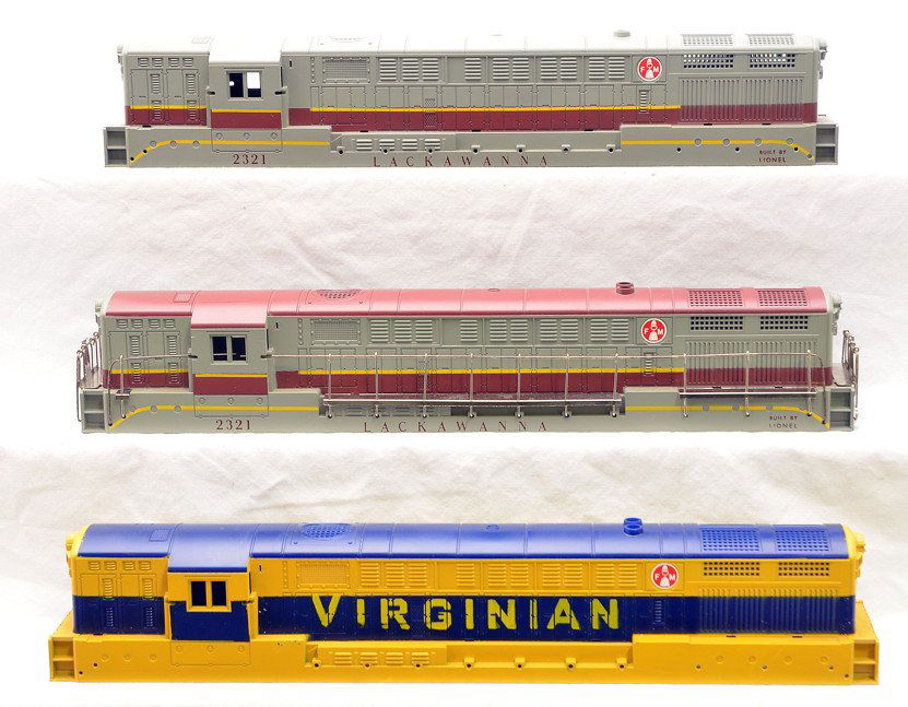 Lionel FM Train Master Shells 2321 2321 2331: Lionel postwar restored FM Train Master shells for a 2321 Lackawanna with a maroon roof, 2321 Lackawanna with a gray roof and a 2331 blue and yellow Virginian. The 2321 Lackawanna with maroon roof has