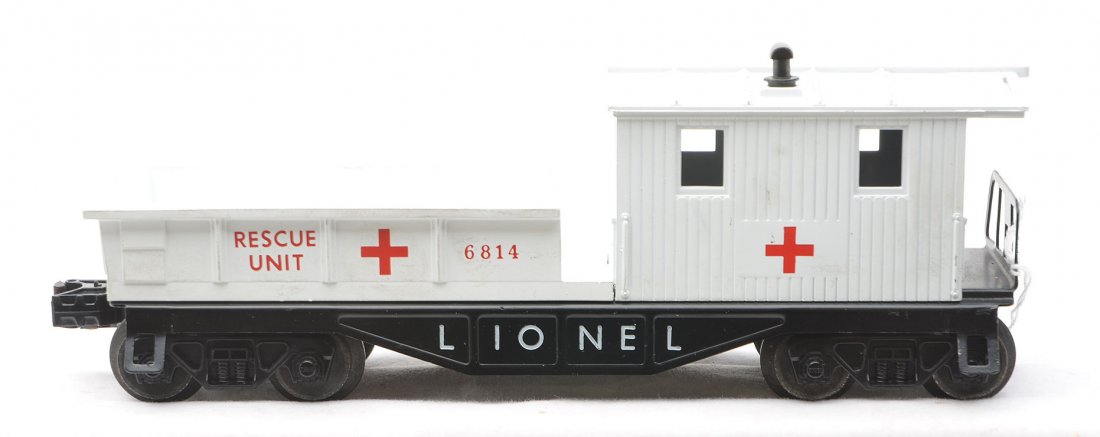 Lionel 6814-50 White Rescue Unit Work Caboose: Scarce Lionel postwar 6814-50 white rescue unit work caboose. This caboose has a black frame with AAR trucks and one operating coupler. This caboose was issued with no loads or man. This caboose came 