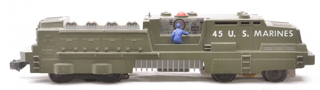 Lionel no. 45 Olive U.S. Marines Mobile Launcher: LIonel postwar no. 45 olive U.S. Marines mobile missile launcher. Launcher has one broken step, box rubs and has never been run. Other than the broken step launcher is C7-8.