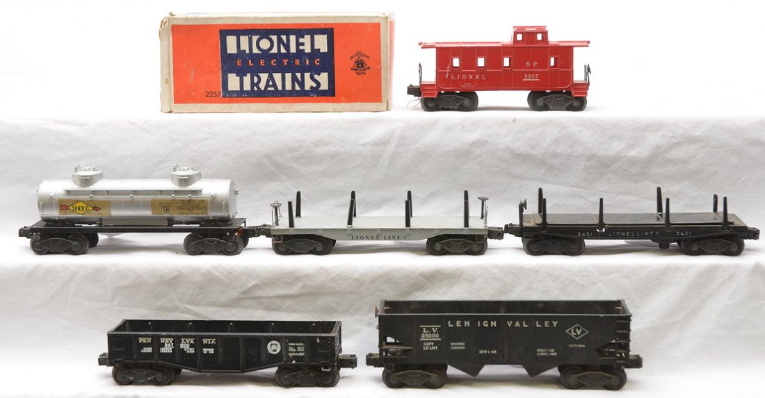 Lionel Freights 2456 2465 2452X 3451 2411 2257: Lionel postwar freight cars; 2456 black Lehigh Valley hopper, 2465 silver Sunoco two dome tank, 2452X black Pennsylvania gondola, 3451 automated log dump car missing load, 2411 flatcar missing load an