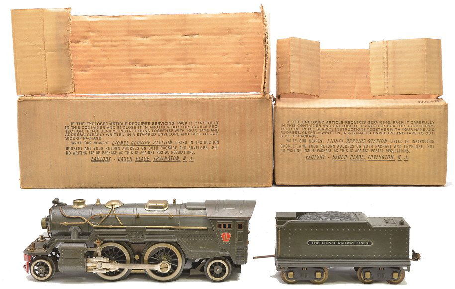 Lionel 385E Gunmetal Loco 385W Die Cast Tender: Lionel prewar standard gauge 385E gunmetal gray 2-4-2 steam loco with a 385W die cast tender both in OBs that have original cardboard inserts. The loco and tender have nickel trim and the tender has n