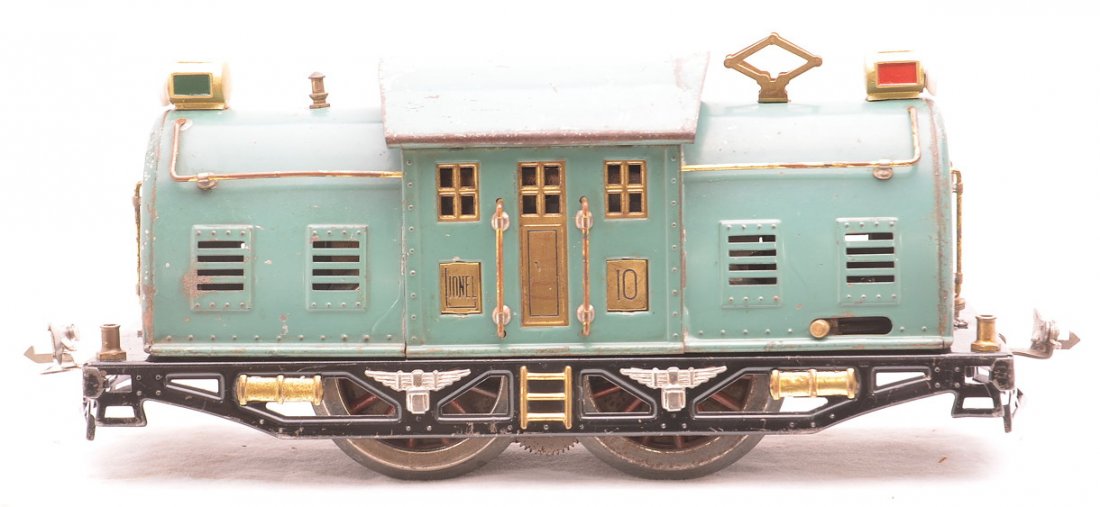 Lionel Std. Ga. no. 10 Peacock Electric Loco: Lionel prewar standard gauge no. 10 peacock electric 0-4-0 loco with brass inserts and black lettering. Both headlights, one coupler and the pickup roller assembly have all been replaced. Loco is C5.