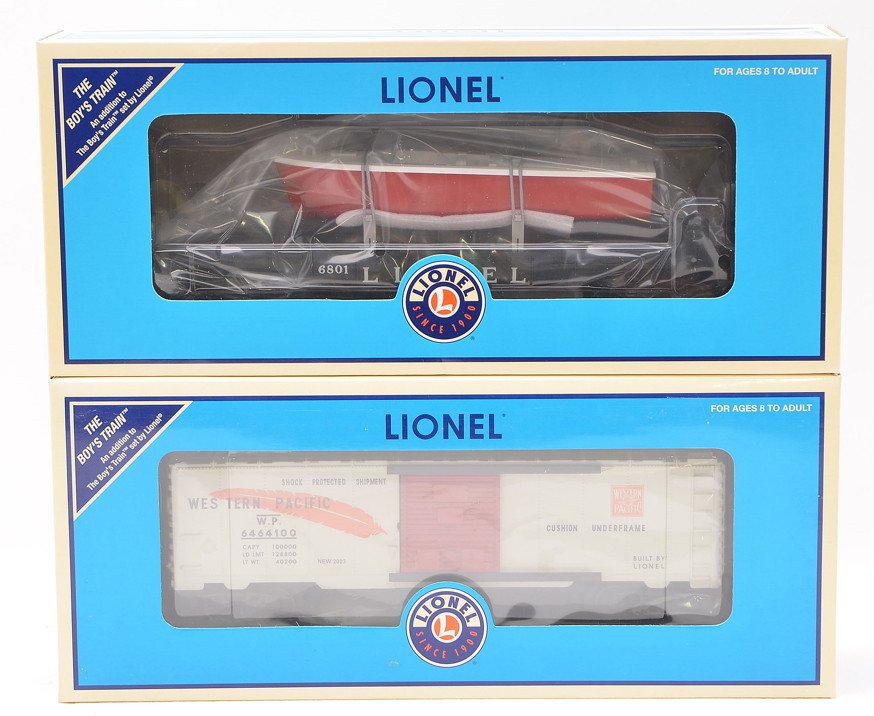 Lionel 26078 Flatcar w/Boat 39257 WP Boxcar MIB: Lionel 26078 LL flatcar 6801 with boat and a 39257 Western Pacific boxcar 6464 both factory new in blue boxes, C10.