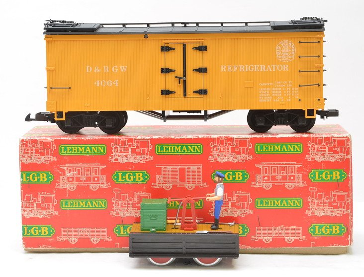 LGB 4064 D&RGW Reefer MIB 2001 Handcar: LGB G scale 4064 D&RGW yellow refrigerator car with black roof in a worn OB, C9. Also included is a LGB 2001 handcar, C9.