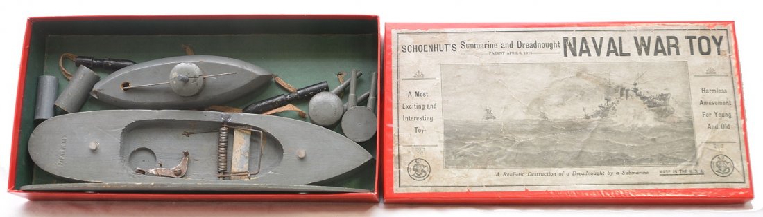 Schoenhut Submarine Naval War Toy Boxed: Schoenhut wooden submarine and dreadnought Naval war toy in OB, C5-6. The box has a label that is intact and a direction sheet on the underside of the lid. Box has no split corners.