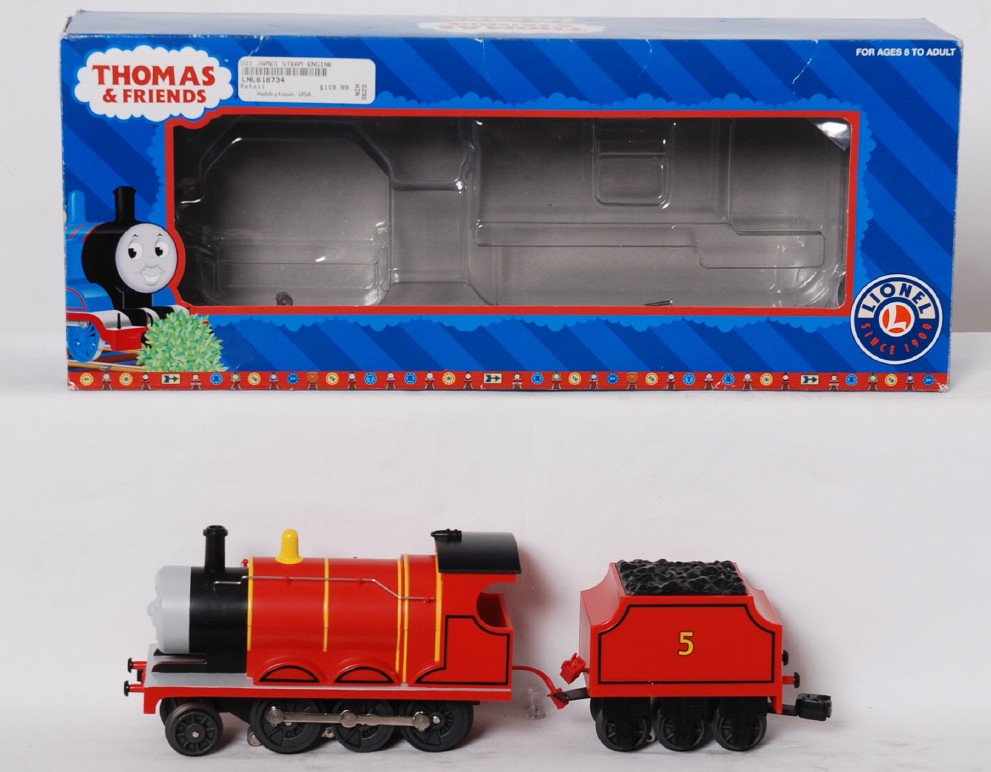 Lionel Thomas and Friends 18734 James steam locomotive: Lionel modern O gauge Thomas and Friends 18734 James steam locomotive in OB. Loco is C7+ Loco has two broken hand rail stanchions and tender pick up roller rivet needs replaced. OB has some light shel