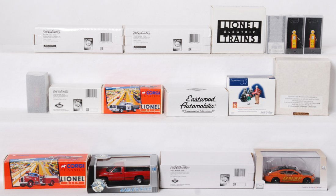11 Die cast Lionel and other vehicles Corgi, Eastwood, : Lionel and other die cast vehicles in OBs. Includes Corgi 51302 Lionel police car, 52402 Lionel Mack B pumper, LCCA BNSF police car, Eastwood Lionelville police and taxi pair, 3522 truck and car pair,