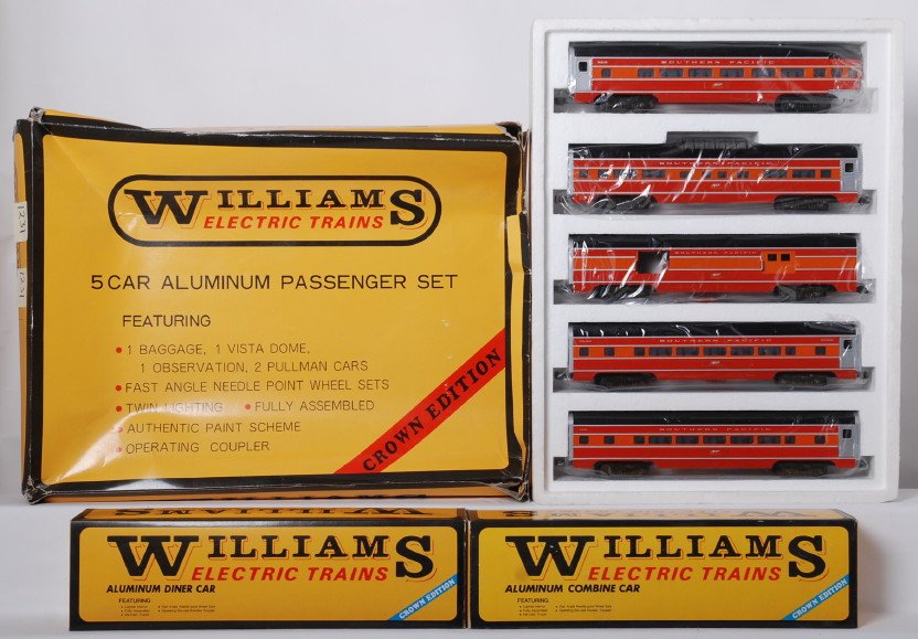 Williams Southern Pacific 7 car aluminum passenger set: Williams modern O gauge Southern Pacific aluminum passenger car set in OBs. Includes 2612 five car set, 2612-C combo car, and 2612-D diner. Cars are C8-9 with very light run time. OBs have some wear. 