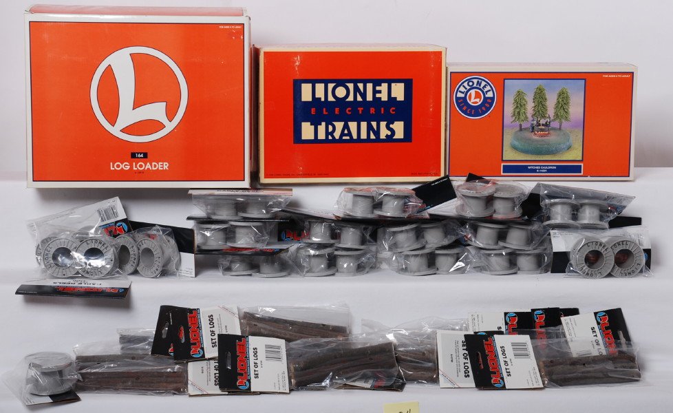 Lionel accessories 12915, 12847, 14221, 12795, etc: Lionel modern O gauge accessories in OBs. Includes 12915 164 log loader, 12847 icing station, 14221 Witches Cauldron, eighteen 12795 cable reel sets, and sixteen 12740 log sets, C9-10.