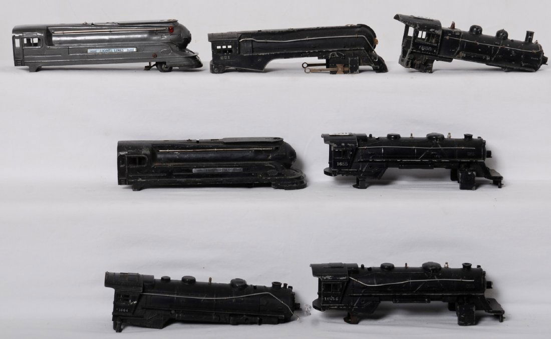 Seven Lionel diecast steam loco shells, 1688E, 221...: Prewar and postwar Lionel O gauge diecast steam locomotive shells, 1688E, 1656, 221, 1688, 1655, 1654, 1664. Sold as is shown in our photos with no returns. One of many parts lots.